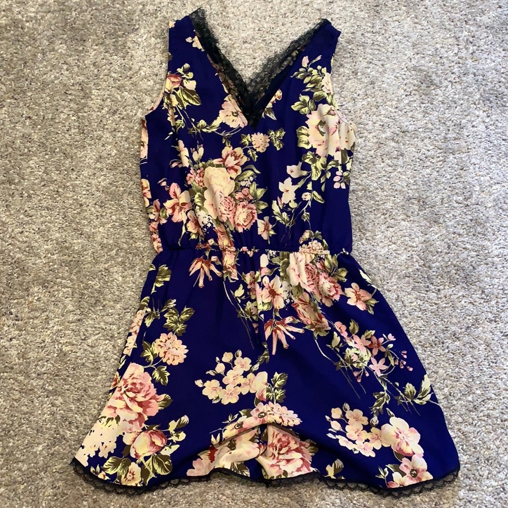 Floral print romper with black lace trim!